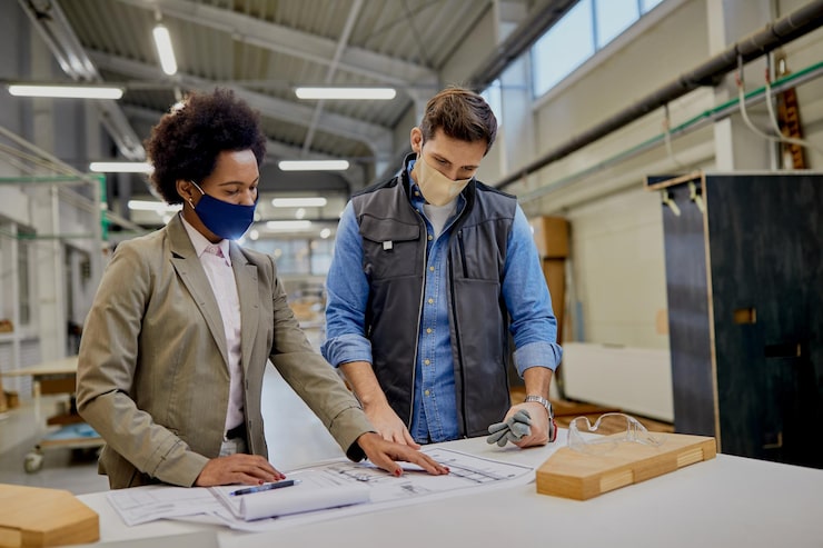 woodworker-black-businesswoman-examining-blueprints-factory-coronavirus-pandemic_637285-11917 woodworker-black-businesswoman-examining-blueprints-factory-coronavirus-pandemic_637285-11917